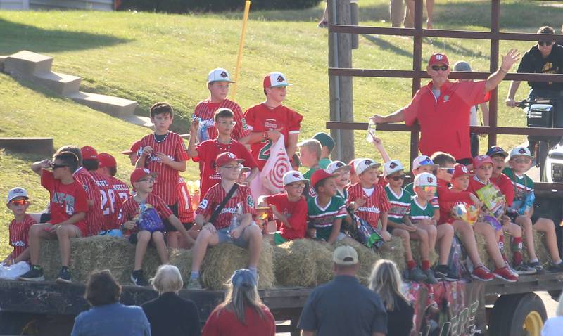 L-P youth baseball players ride on a float during the L-P Homecoming parade on Thursday, Sept. 26, 2024 near the corner of 7th Street and Orleans Street in Peru.