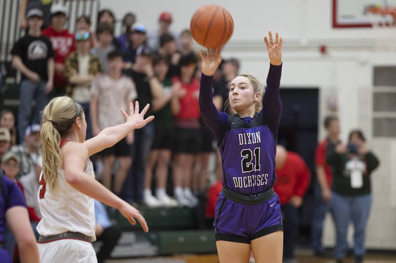 Dixon’s Reese Dambman puts up a three-point shot in the class 3A super sectional Monday, Feb. 26, 2024 at LaSalle-Peru High School.