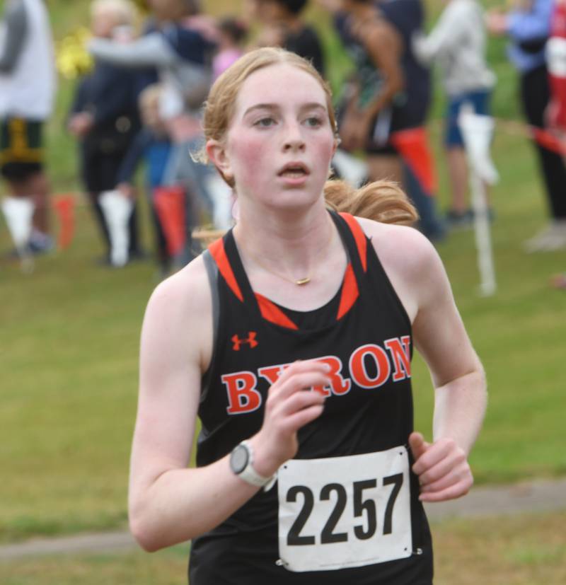 Byron's Ashley Potter sprints to the finish line at the Amboy Columbus Day Cross Country Invitational held at Shady Oaks Country Club near Amboy on Monday, Oct. 13, 2025. She finished 10th.