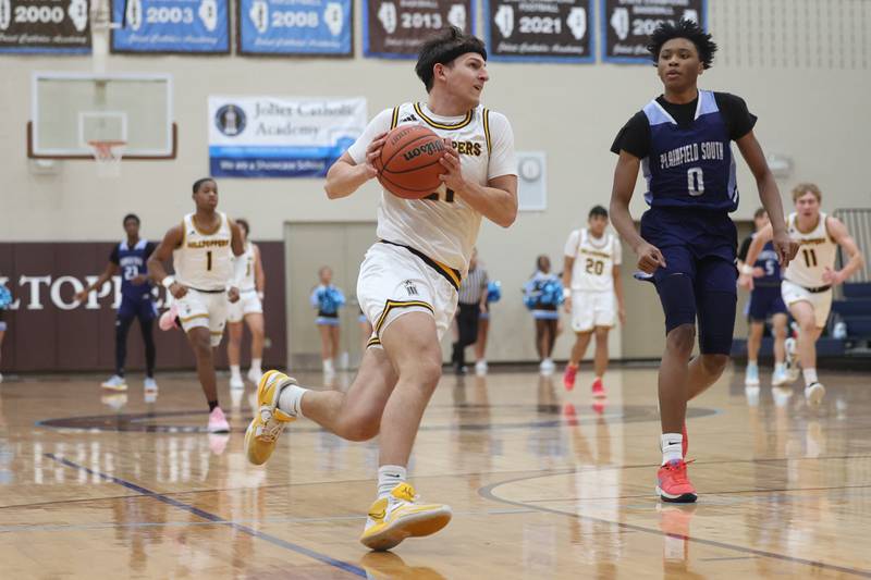 Joliet Catholic’s Owen Wiers drives to the paint against Plainfield South on Wednesday, Jan. 17th, 2024 in Joliet.
