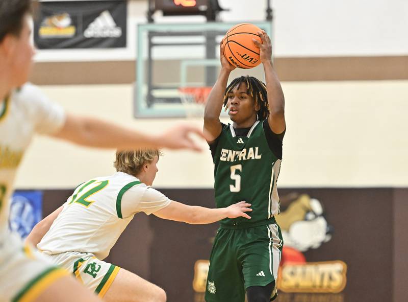 Plainfield Central's Treyvon Smith (5) in action during the WJOL tournament game against Plainfield Central on Friday, NOV. 28, 2025, at Joliet.