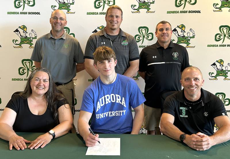 Recent Seneca graduate Asher Hamby has signed to continue his education at Aurora University and his football career at the NCAA Division III level with the Spartans. Hamby was a running back/strong safety for the Fighting Irish and three-time first-team selection to The Times All-Area Football Team. Pictured at his signing ceremony are (from left, front) are Jenny Keedy, Asher Hamby, Bill Hamby along with (from left, back) Levi Derber, Terry Maxwell and Ted O’Boyle.