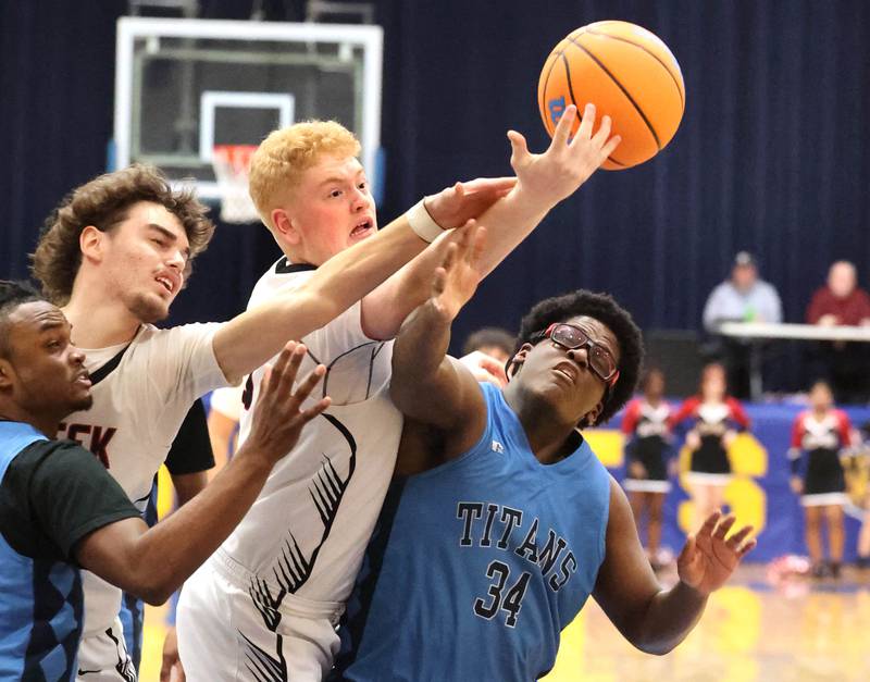 IMSA’s Lota Onwuameze tries to box out Indian Creek's Isaac Willis Friday, Feb. 6, 2026, during their Little 10 Conference championship game at Somonauk High School.