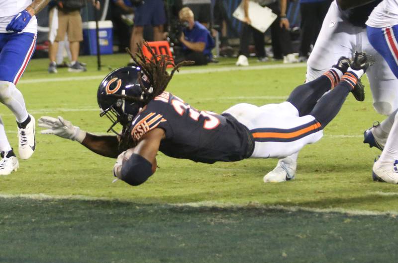 Chicago Bears running back Ian Wheeler, dives into the end zone to score a touchdown against the Buffalo Bills on Sunday, Aug. 17, 2025 at Soldier Field in Chicago.