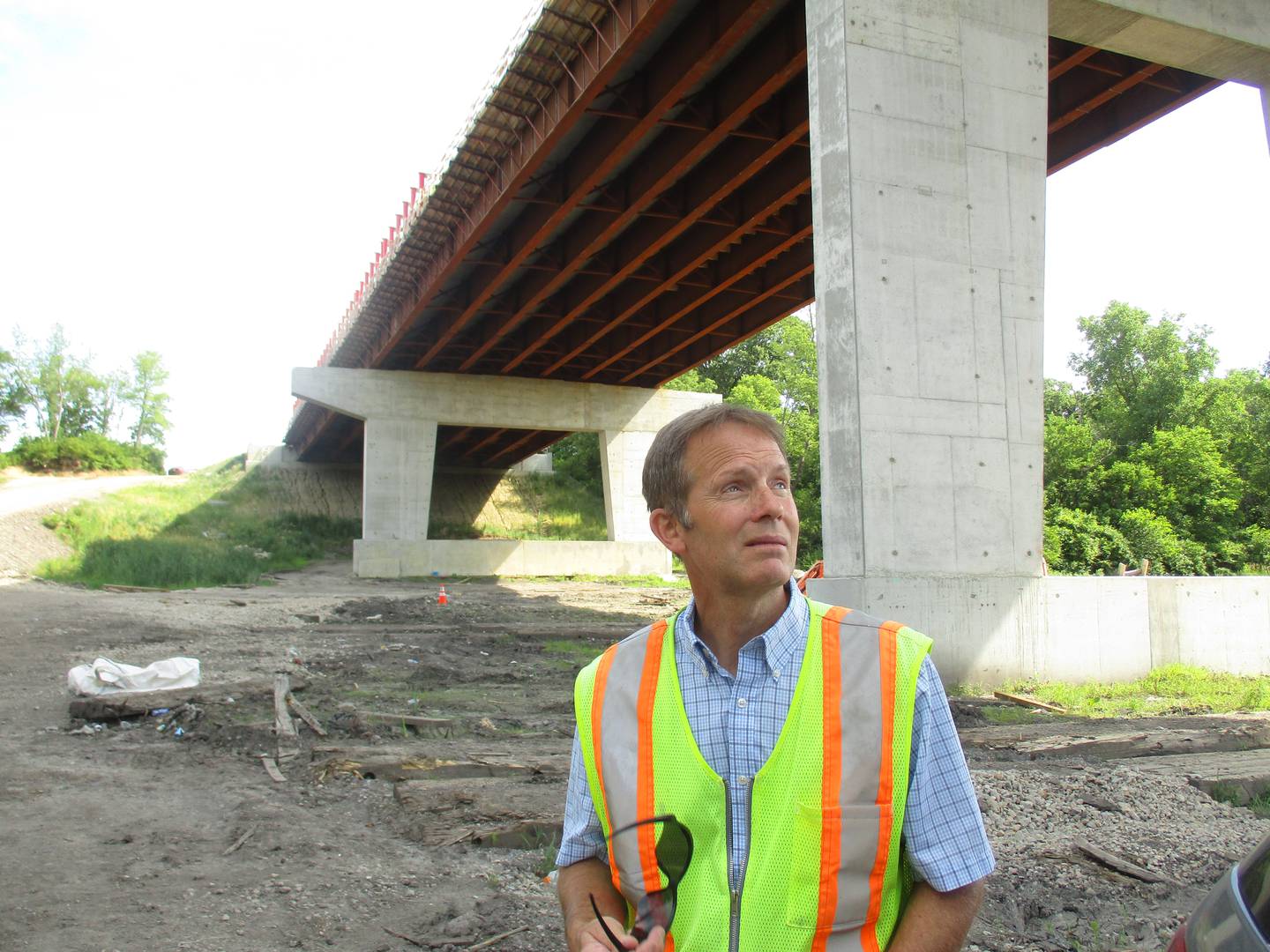 Kendall County Highway Engineer Fran Klaas inspects the construction progress on the Eldamain Road bridge. (Mark Foster -- mfoster@shawmedia.com)