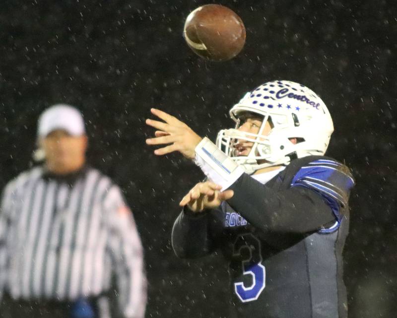 A snap flies past Burlington Central’s Landon Arnold against Harlem in IHSA football Class 6A second-round playoff action at Central High School in Burlington on Saturday, November 8, 2025.