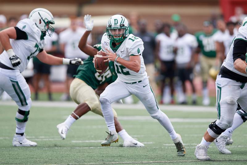 Dartmouth quarterback Derek Kyler looks to make a pass against Jacksonville on September 21, 2019 at D.B. Milne Field in Jacksonville, Florida. Dartmouth defeated Jacksonville 35-6.