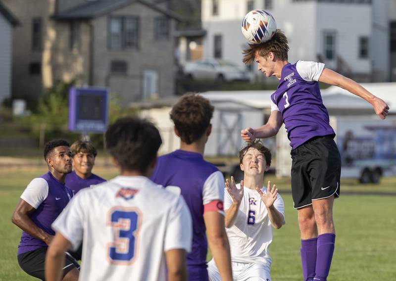 Dixon’s Dylan Osmer heads the ball against Genoa-Kingston Tuesday, Sept. 2, 2025.