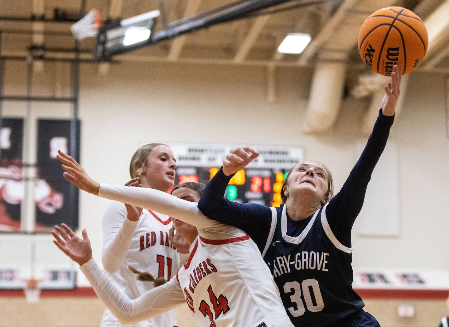 Cary-Grove High School guard Sam Skerl goes up for a layup during a game against Huntley High School on Tuesday, Dec. 3, 2024.