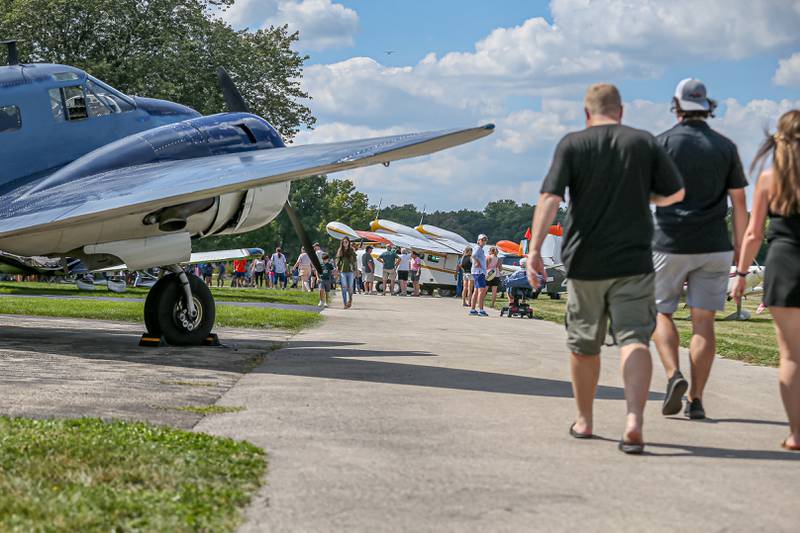 Guests enjoy planes on display at the Brookeridge Airport Fly in.  Sept 10, 2022