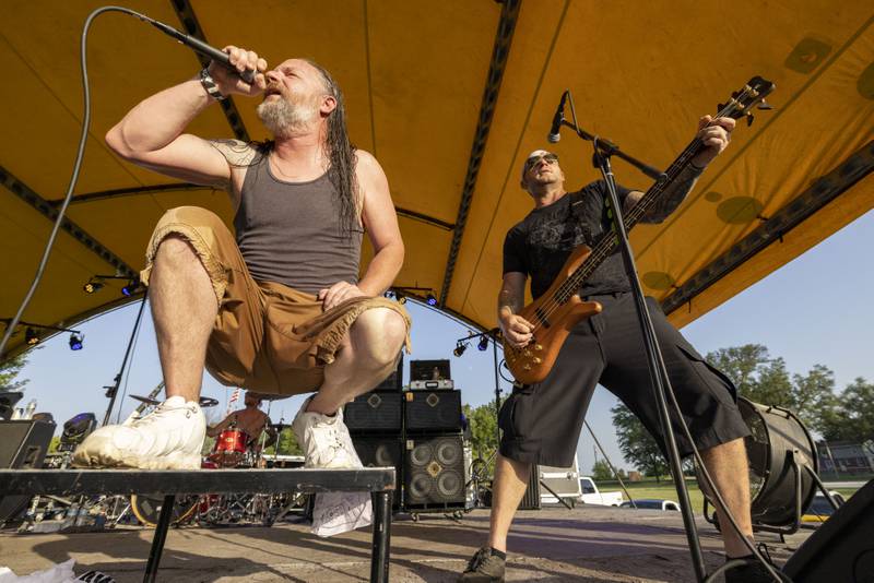 Vocalist Jami Correll and Bassist Dan Tremblay of the band Dropt, perform at the Cops 4 Cancer event on Friday, July 28, 2023.