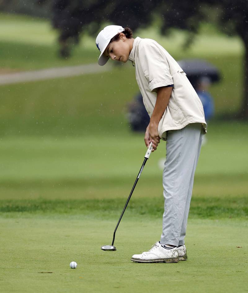 Caden Shanahan, St. Charles North, putts during the DuKane Conference Boys Varsity Tournament Tuesday, Sept. 24, 2024 Bartlett Hills Golf Club.