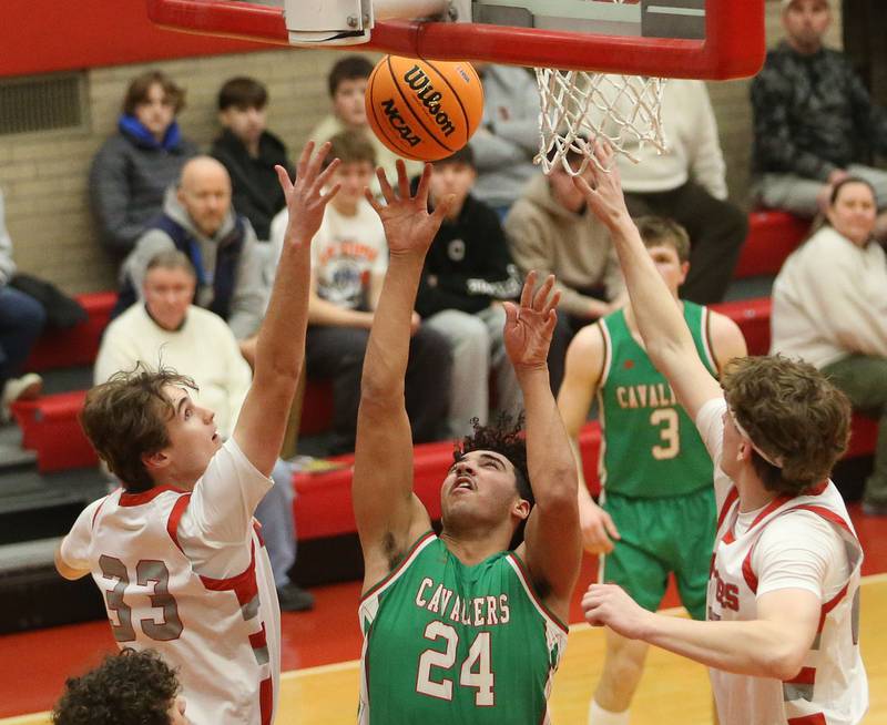 L-P's Marion Persich lets go of a shot under the hoop against Morton's Thomas Krupa during the Class 3A Sectional semifinal game on Tuesday, March 3, 2026 in Kingman Gymnasium at Ottawa High School.