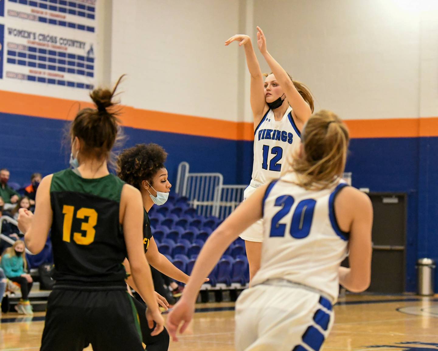 Geneva Zosia Wrobel (12) makes a three point  shot while taking on Fremd in the first quarter of the championship game at Morton College in Cicero.