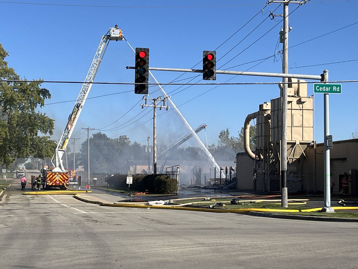 Firefighters responding to a fire on Thursday, Oct. 17, 2024, at Tri-Star Cabinets and Top Company in New Lenox.