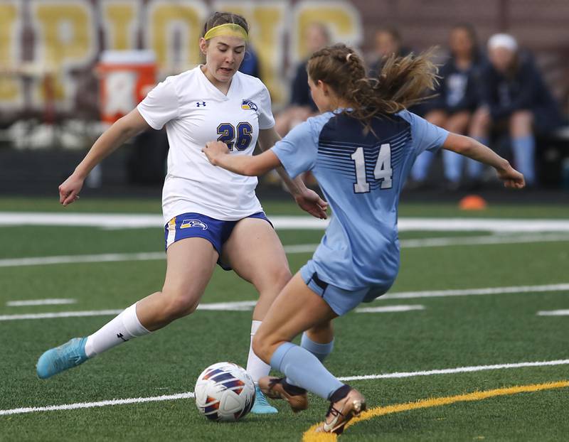 Johnsburg's Elaina Moss tries to take a shot at goal as she is defended by Willows’ Julia Lechner during a IHSA Division 1 Richmond-Burton Sectional semifinal soccer match Tuesday, May 16, 2023, at Richmond-Burton High School.