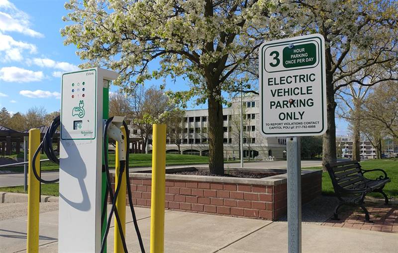 An electric vehicle charging station is pictured outside of the Illinois State Capitol Complex in Springfield.