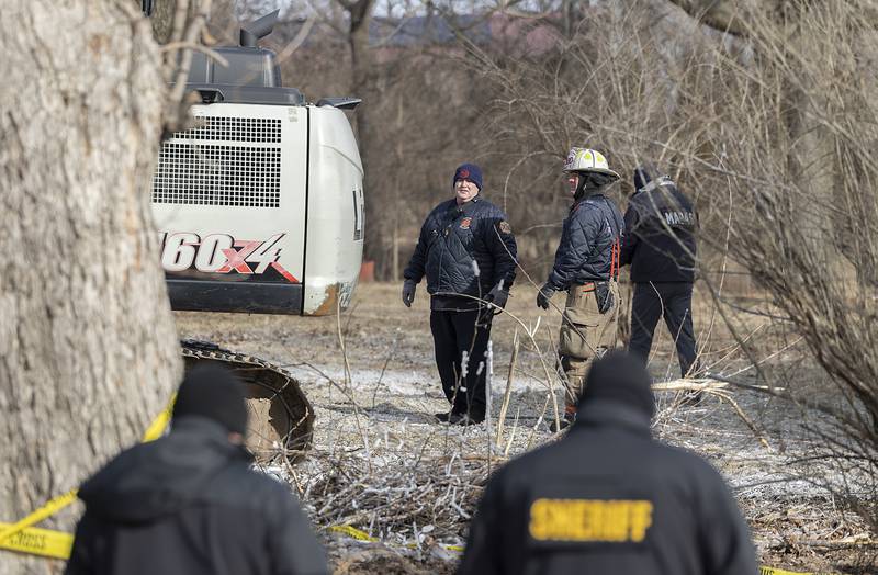 Sterling Deputy Chief Dave Northcutt and Dixon Rural Chief Dustin Dahlstrom work at the scene of the rural Sterling fire Monday, Jan. 20, 2025.