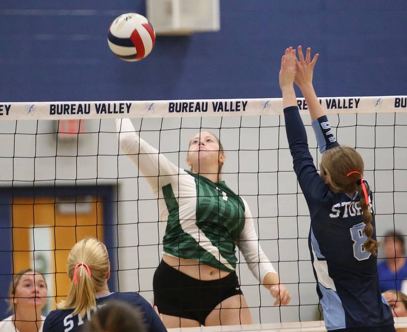 St. Bede's Reagan Stoudt hits the ball past Bureau Valley's Addie Mitchell on Tuesday, Sept. 5, 2023 at Bureau Valley High School.