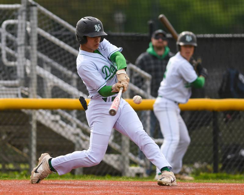 York's Drew Gami (17) makes contact with the ball during the game on Monday May 19, 2025, while taking on Downers Grove North held at York High School in Elmhurst.