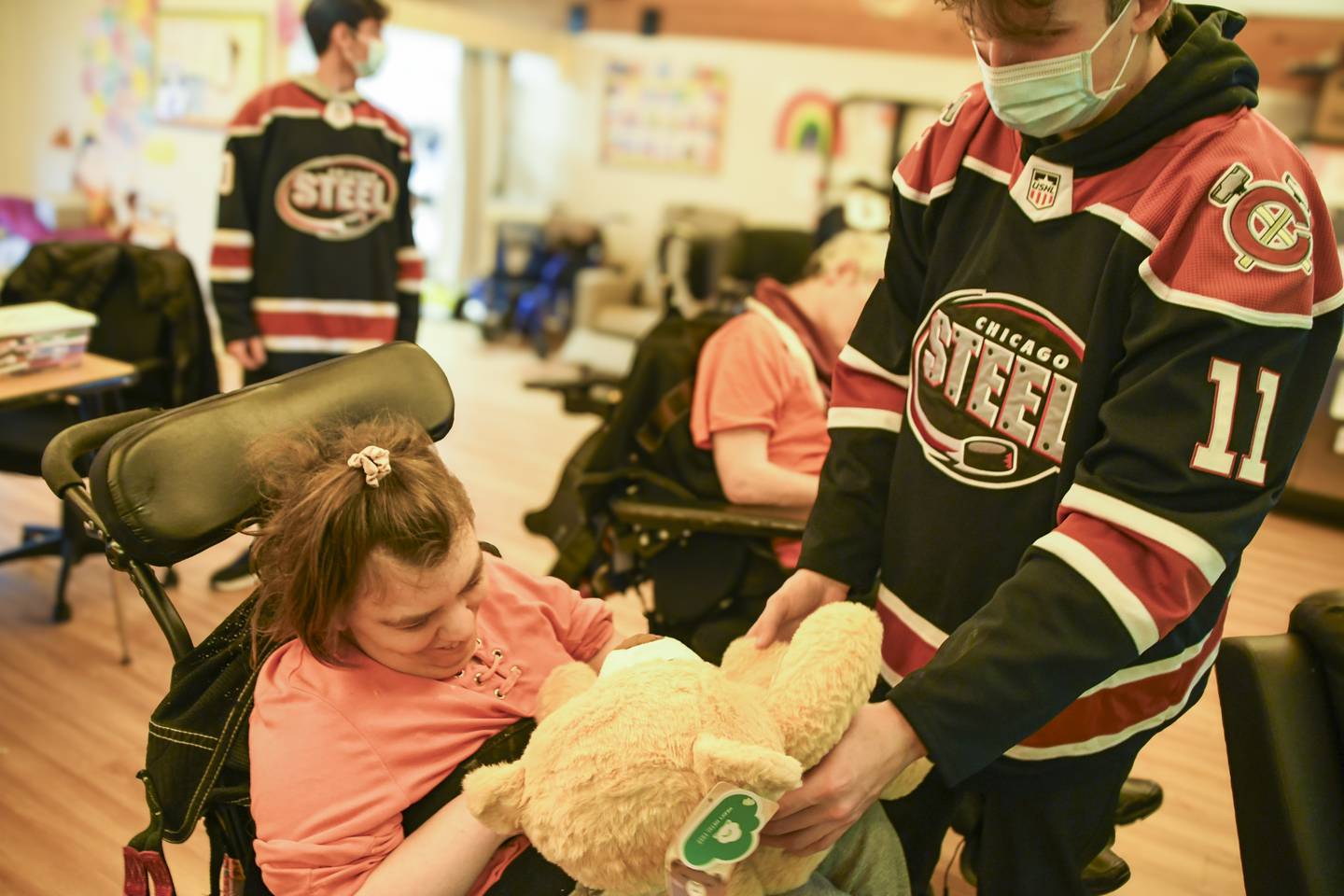 Members of the Chicago Steel hockey team visited the Marklund Hyde Center near Geneva to give out teddy bears to its residents. The bears were donated by fans during its 'Teddy Bear Toss' event.