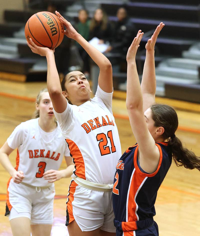 DeKalb’s Alicia Johnson shoots over Naperville North's Anna Richards Monday, Jan. 22, 2024, during their game at DeKalb High School.