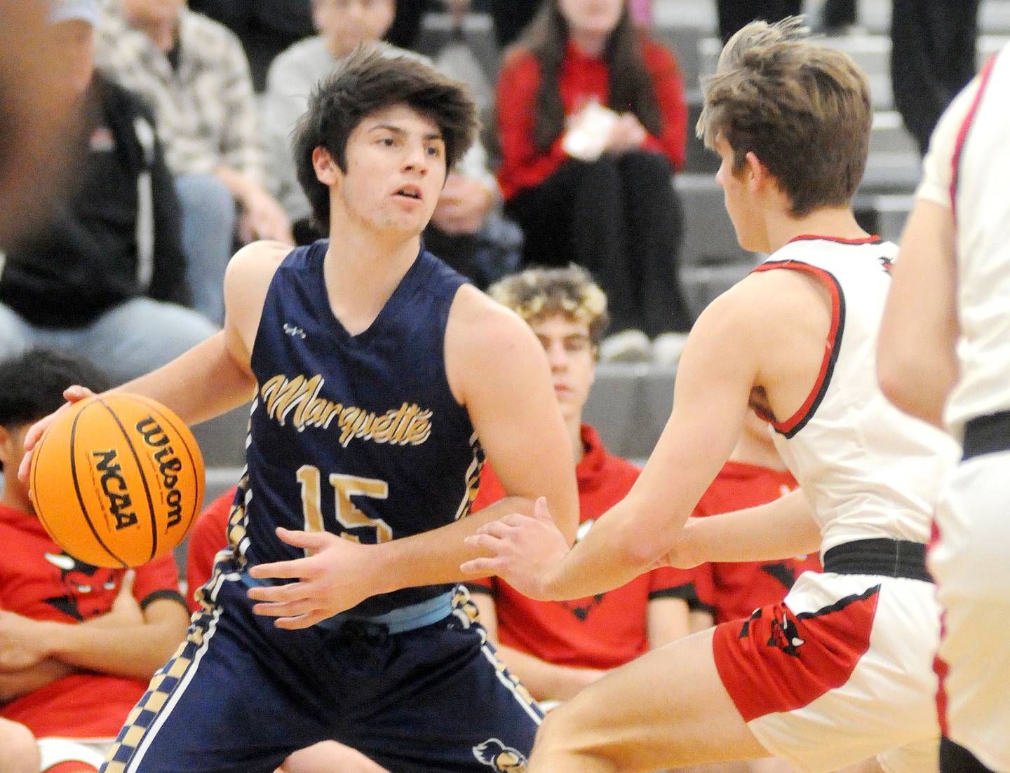 Marquette's Alec Novotney looks to pass against Hall on Thursday, Dec. 26, 2024, at Seneca High School.