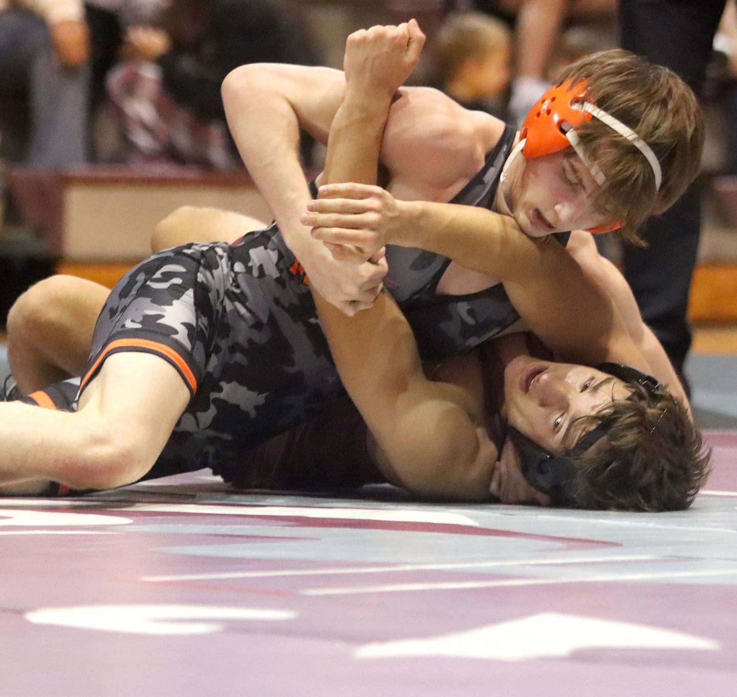 McHenry’s Ryan Johnston, top, battles Prairie Ridge’s Andrew Cioper at 150 pounds in varsity boys wrestling on Thursday, Jan. 8, 2026 at Prairie Ridge High School in Crystal Lake.