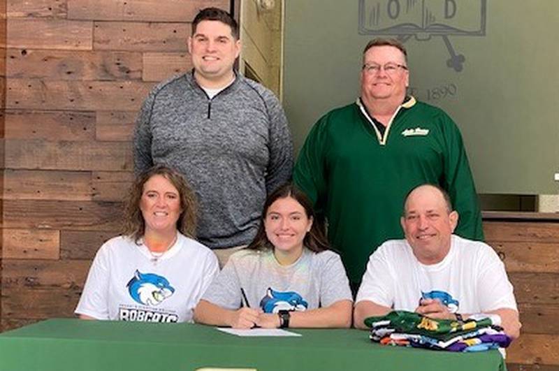 St. Bede's Kaitlyn Kobilsek (seated, center) will continue her softball career at Bryant & Stratton. She was joined by her parents Amy and Dan (seated) and standing left to right, St. Bede athletic director Nick McLaughlin and St. Bede coach Shawn Sons.