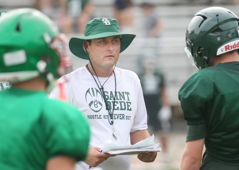 St. Bede head football coach Jack Brady talks to his players during a joint practice on Monday July 21, 2025 at Howard Fellows Stadium.