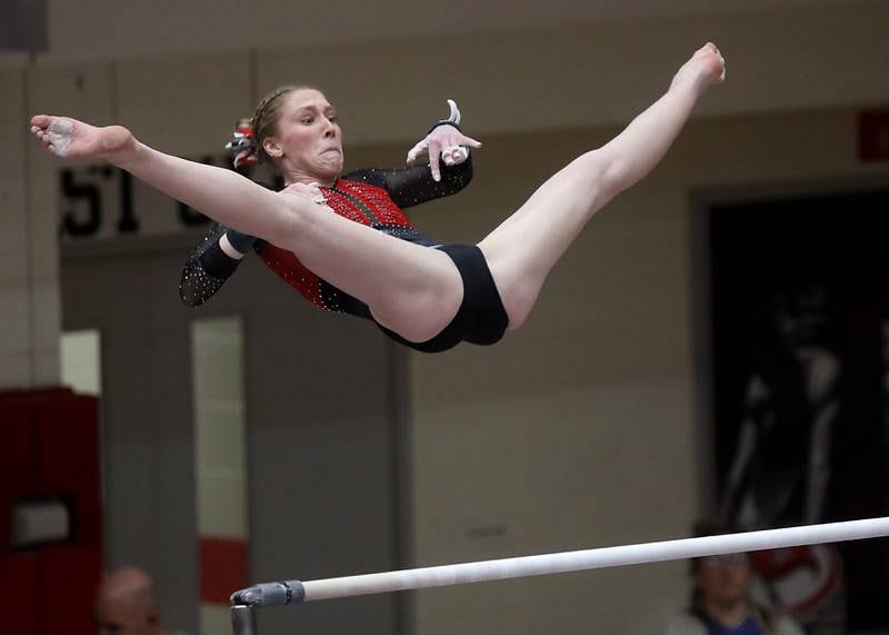 Mundelein’s Lexie Ede competes in the preliminary round of the parallel bars on Friday, Feb. 20, 2026, during the IHSA Girls State Final Gymnastics Meet at Palatine High School.