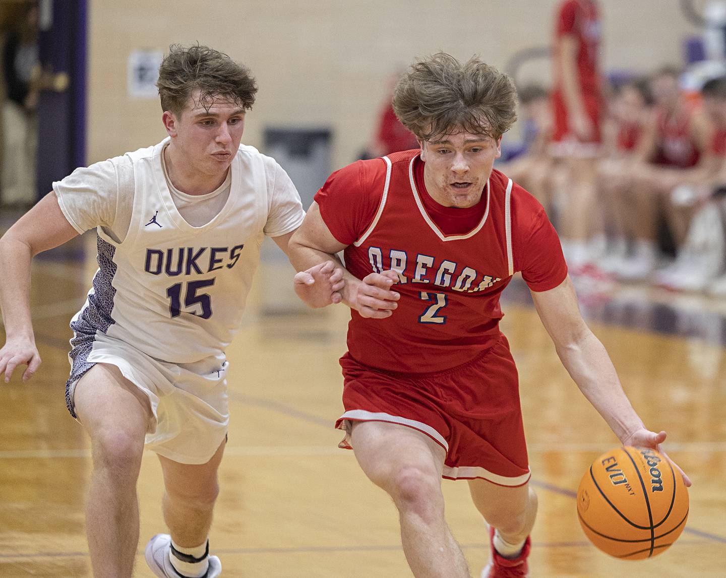 Oregon’s Cooper Johnson drives to the hoop against Dixon’s Jimi Gosinski Tuesday, Feb. 3, 2026.