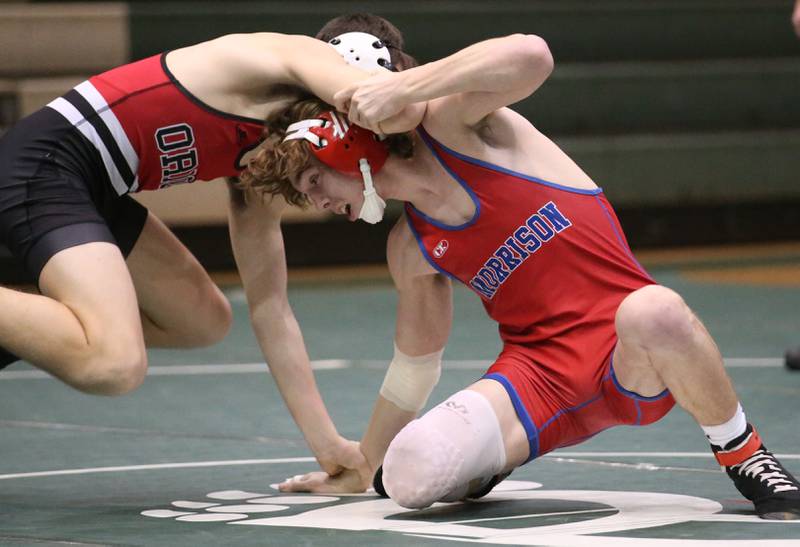 Morrison's Carson White wrestles Orion's Caden Wegerer during a triangular meet on Wednesday, Jan. 18, 2023 at St. Bede Academy.