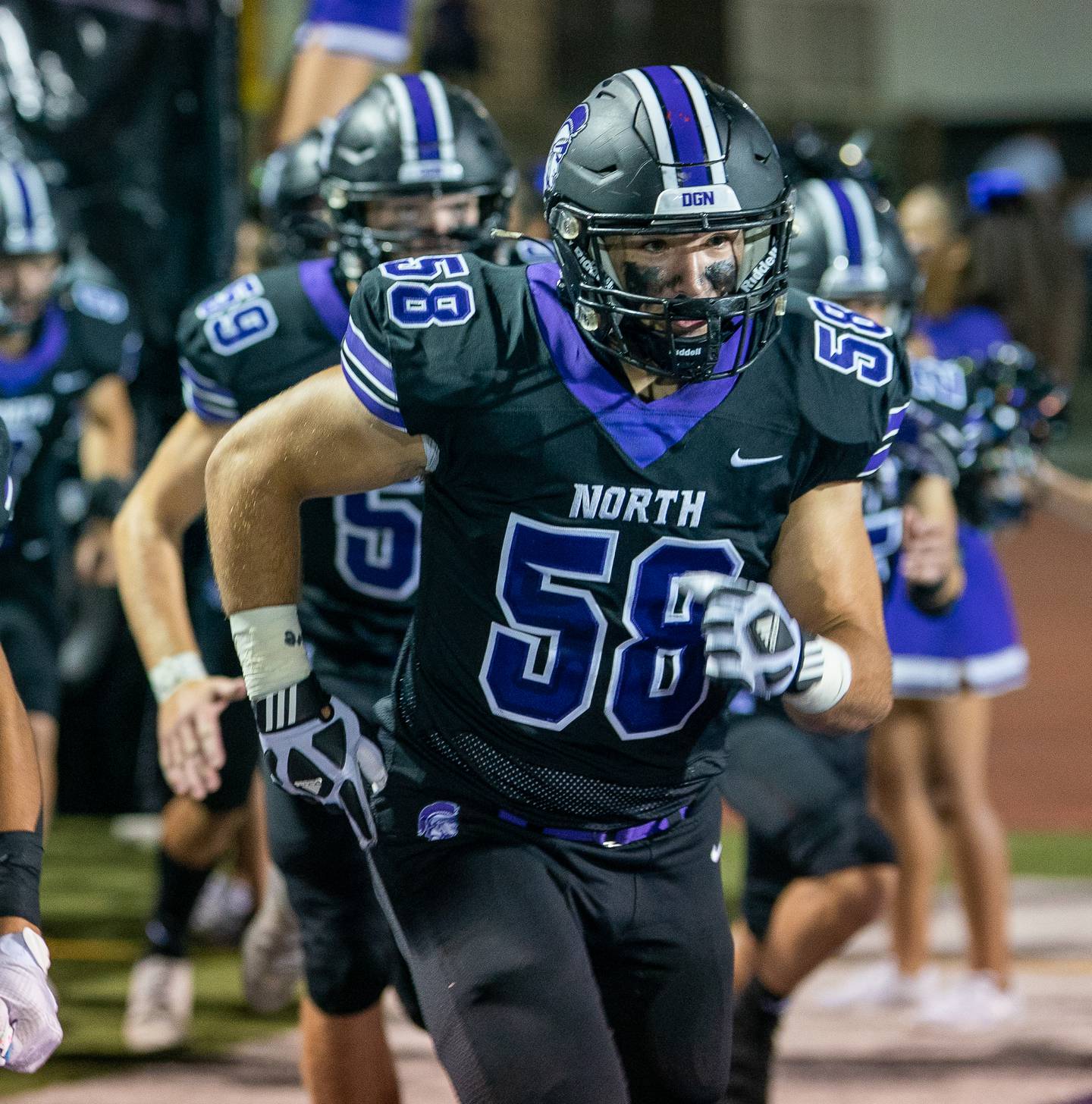 Downers Grove North's Ben Bielawski (58) takes the field against Downers Grove South prior to kickoff at Downers Grove North High School on Tuesday, Sep 9, 2022.