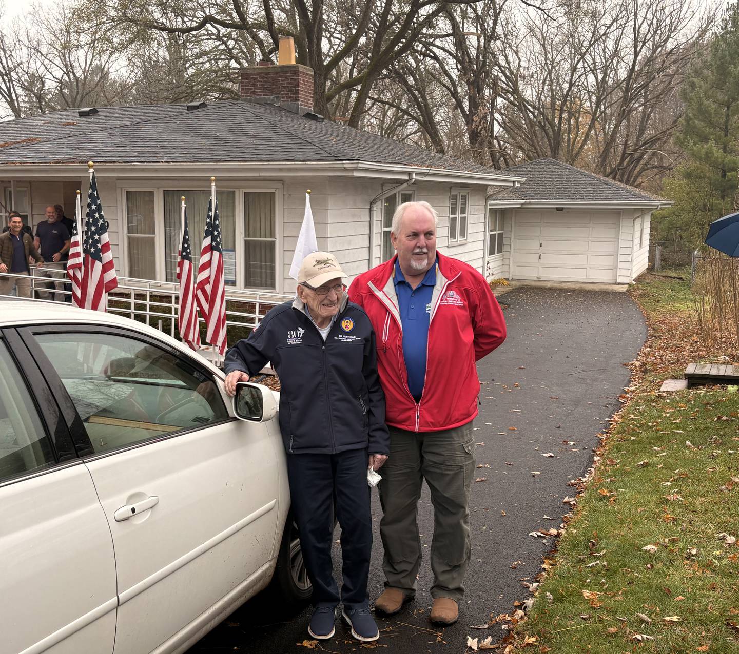World War II veteran Ed Berthold, left, stands with VetsRoll President Mark Finnegan who help renovate Berthold's home to be more accessible.