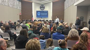 After 5-hour heated meeting, vote delayed for Cary apartment complex with controversial road extension