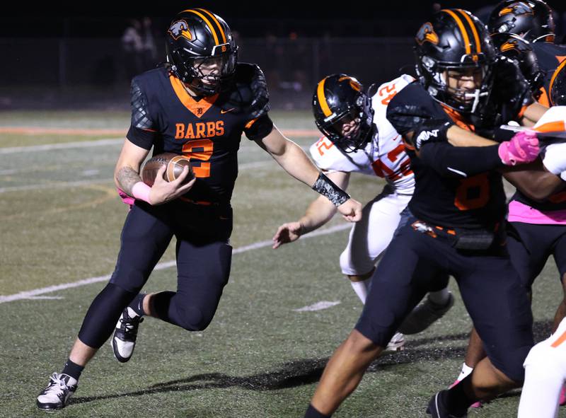 DeKalb's Cole Latimer gets by Lincoln-Way West's Gavin Larson during their game Friday, Oct. 3, 2025, at DeKalb High School.