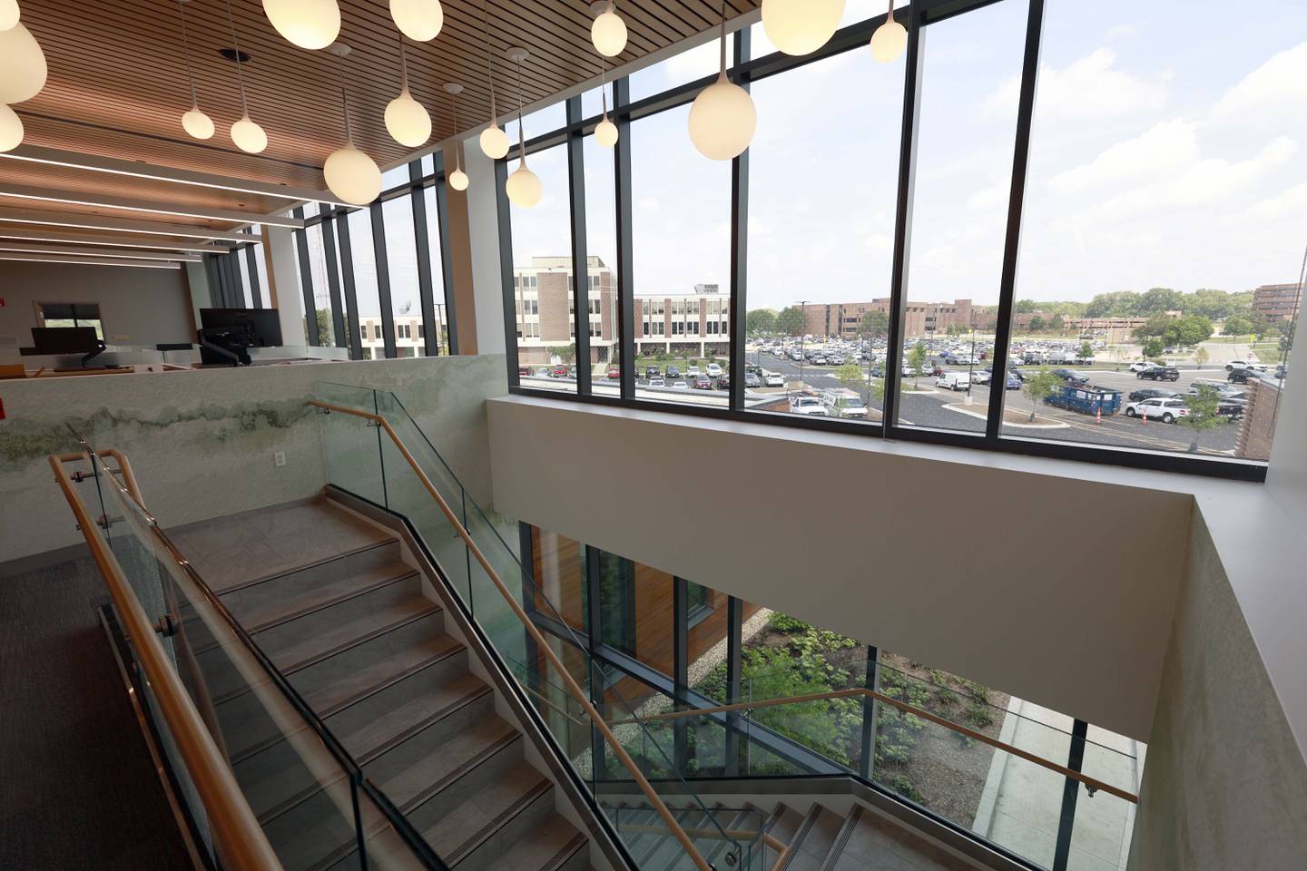 Stairs to the second level and staff area of the new DuPage County Crisis Recovery Center Wednesday, in Wheaton. The center will serve as an alternative to hospital emergency rooms. Family members, emergency medical services workers and law enforcement officials will be able to bring adults and young people experiencing a mental health or substance use crisis to the new facility.