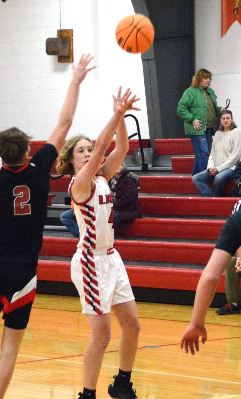 LaMoille's Harley Blair fires away against Amboy Saturday at Dean Madsen Gymnasium.