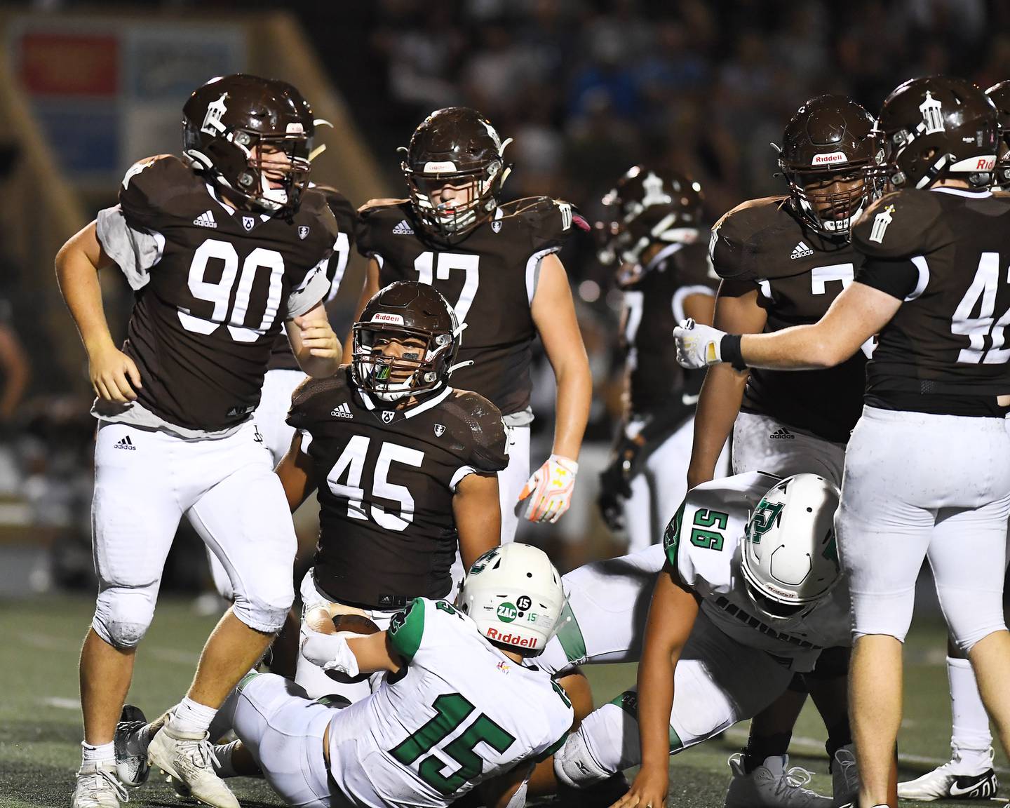 Joliet Catholic's defensive gang tackle Providence Catholic's Ethan Litynski on Friday, Sep.  17, 2021, at Joilet Memorial Stadium in Joilet, IL.
