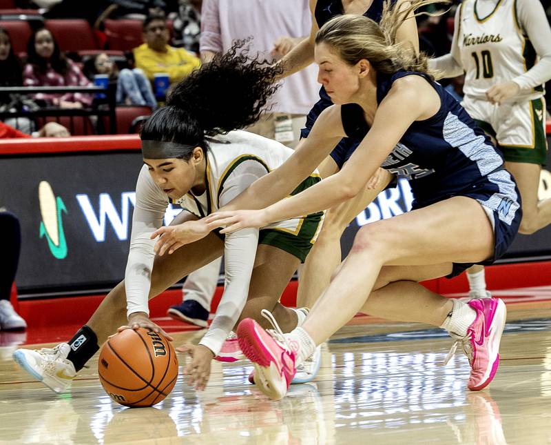 Waubonsie Valley’s Arianna Garcia and Nazareth Academy’s Amalia Dray chase after a ball Friday, March 1, 2024 in the girls basketball 4A state semifinal at CEFCU Arena in Normal.