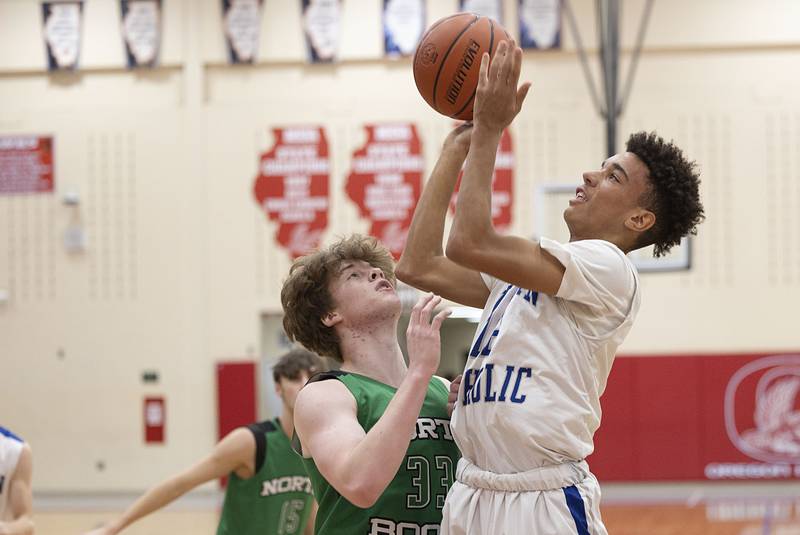 Newman's Isaiah Williams puts up a shot Monday, Nov. 21, 2022 while playing North Boone in the Oregon Thanksgiving Tournament.