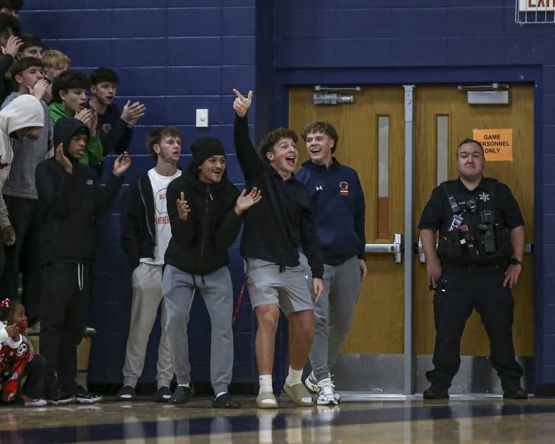 The Oswego student section reacts after a basket is scored during their basketball game between West Aurora at Oswego Monday, Nov 24, 2025 in Oswego.