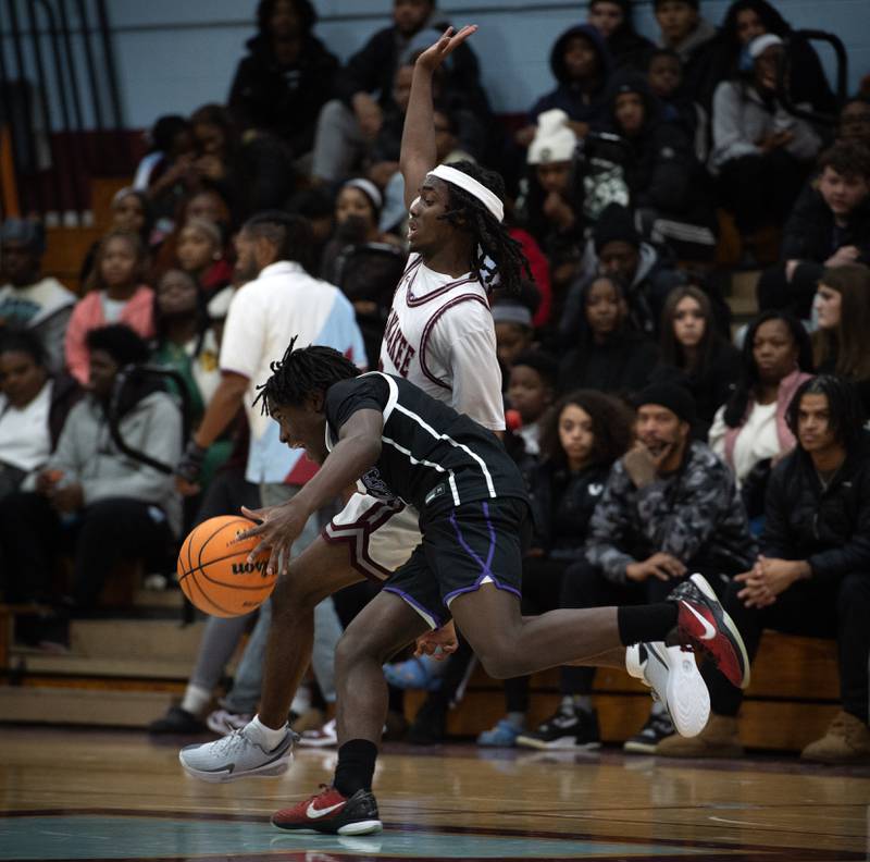 Kankakee's Cedric Terrell III tightly guards Thornton's DaKari Nesbitt in a game on Friday, December 12, 2025.