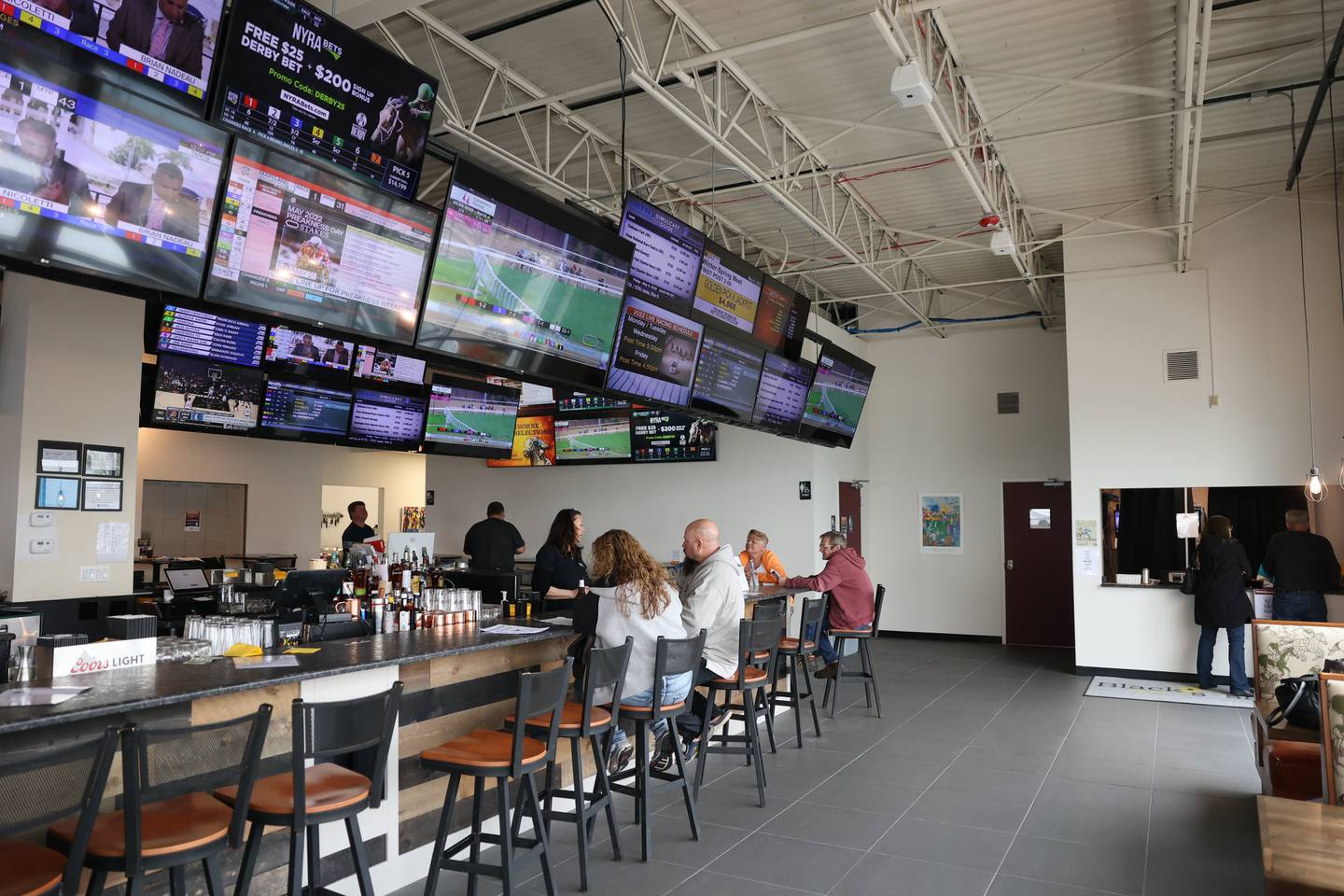 The new Club Hawthorne at Black eyed Susan in Joliet provides customers an option to eat and drink while placing and tracking their bets. Friday, May 6, 2022, in Joliet.