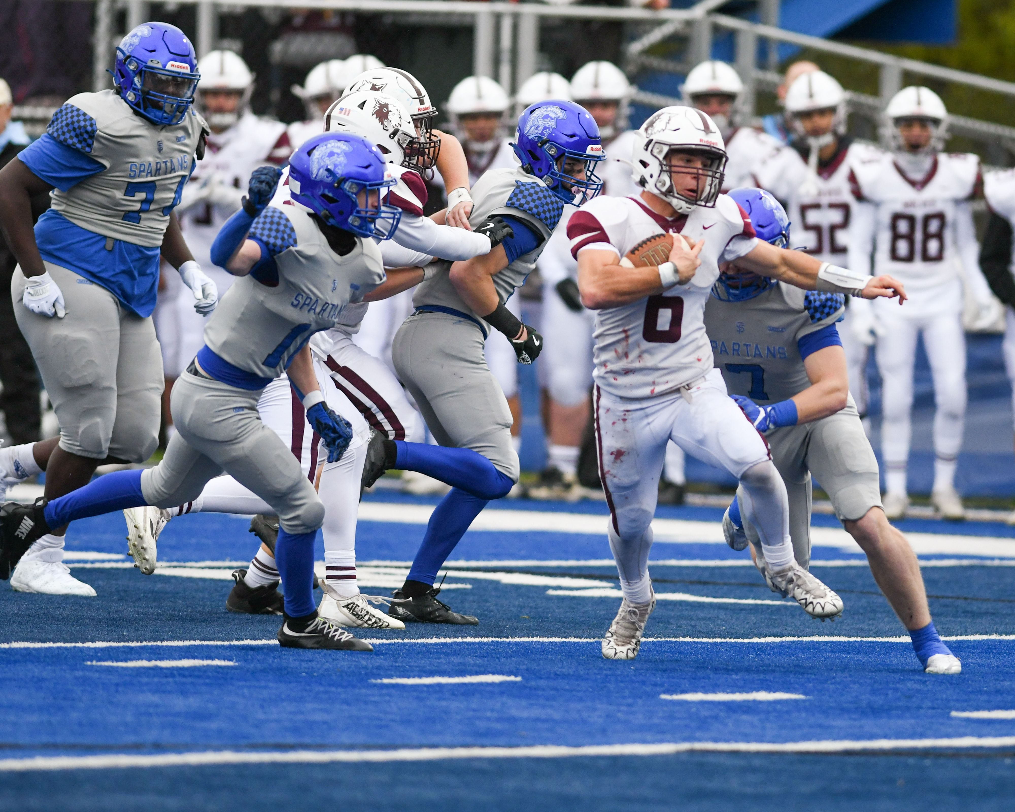 Prairie Ridge's Luke Vanderwiel (6) runs the ball for some yards before being brought down on Saturday Nov. 8, 2025; while taking on St. Francis held at St. Francis's High School.