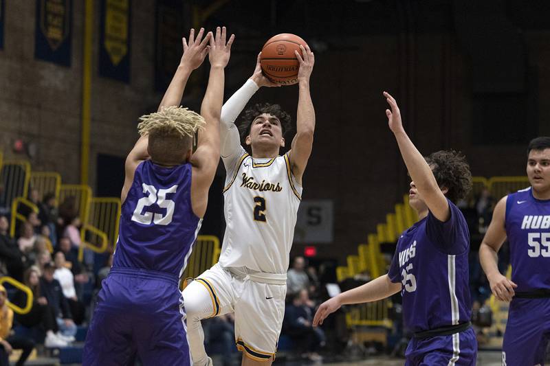 Sterling’s JP Schilling puts up a shot against Rochelle Tuesday, Jan. 31, 2023.