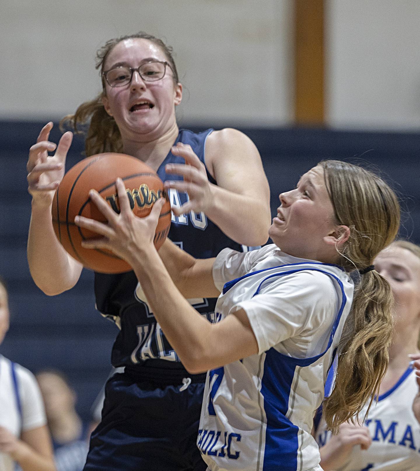 Bureau Valley’s Lynzie Cady fights Newman’s Elaina Allen for a rebound Thursday, Nov. 30, 2023 in Sterling.