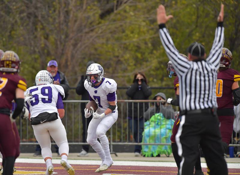 Wilmington's Hunter Osipavicius (7) celebrates after scoring a touchdown against Montini during a Class 3A semifinal game on November 23, 2024 at Montini Catholic High School in Lombard.