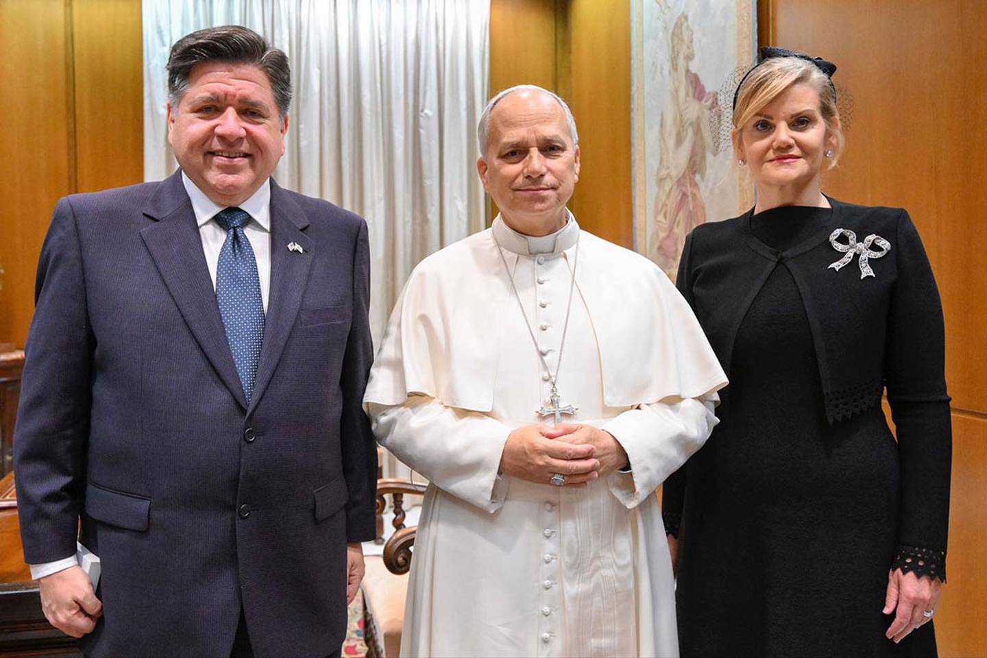 Illinois Gov. JB Pritzker and First Lady MK Pritzker pose with Pope Leo XIV in Vatican City on Wednesday, Nov. 19, 2025.